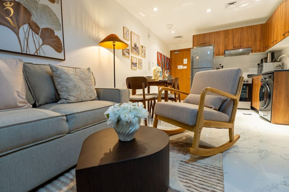 Relax in style with a living room that combines chic decor and cozy seating for the perfect home away from home.