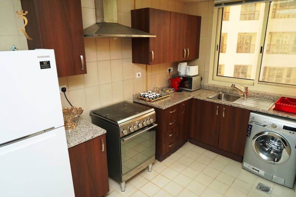 Modern Culinary Haven: Unleash Your Inner Chef in Our Well-Equipped Kitchen