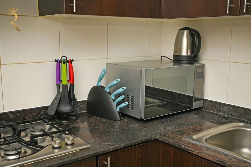 A microwave and kettle.