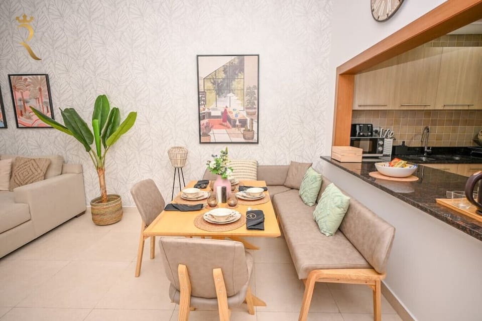 Cozy Conversations: Gather and Relax in the Inviting Sitting Area of Our Living Room.