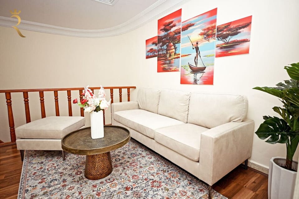 Relax in sophistication: Our stylish sitting area is a sanctuary of comfort and chic design
