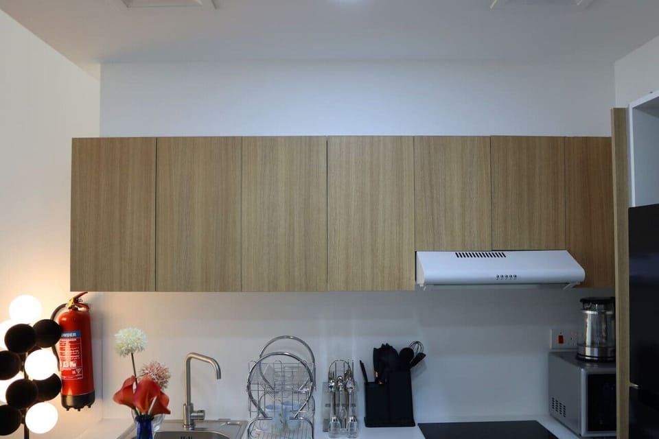 Our kitchen is equipped with the latest appliances, from a dishwasher to a coffee maker, for a seamless cooking experience.