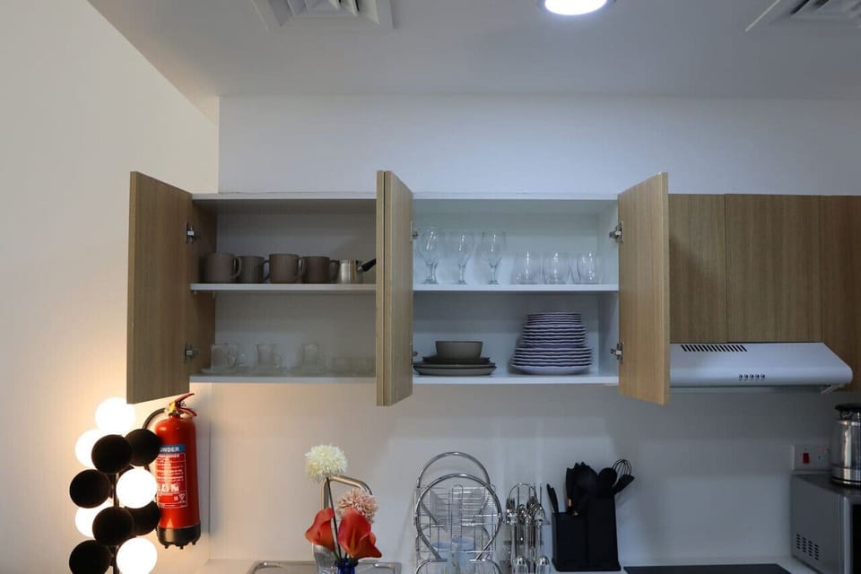 This kitchen features a full suite of high-end appliances, perfect for both everyday meals and entertaining.