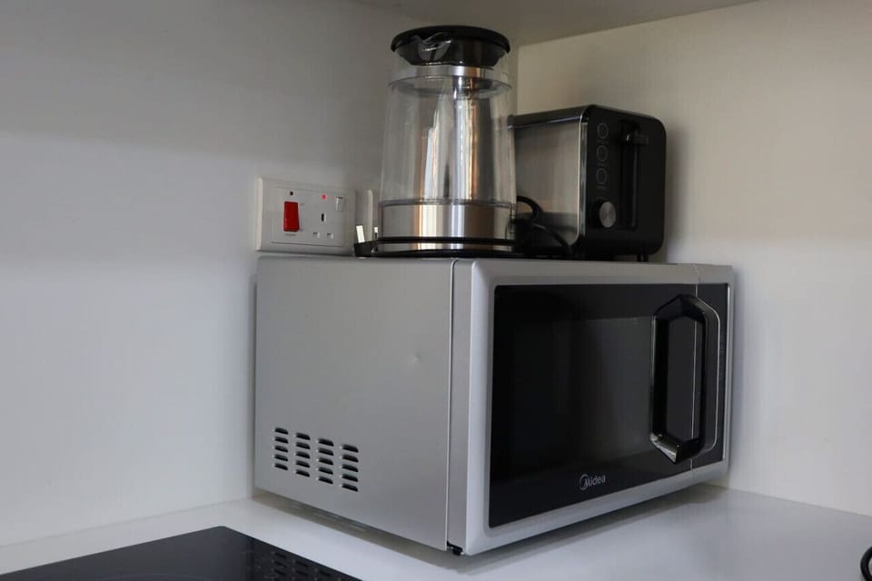 With appliances ranging from a coffee maker to a dishwasher, our kitchen makes culinary tasks a breeze.