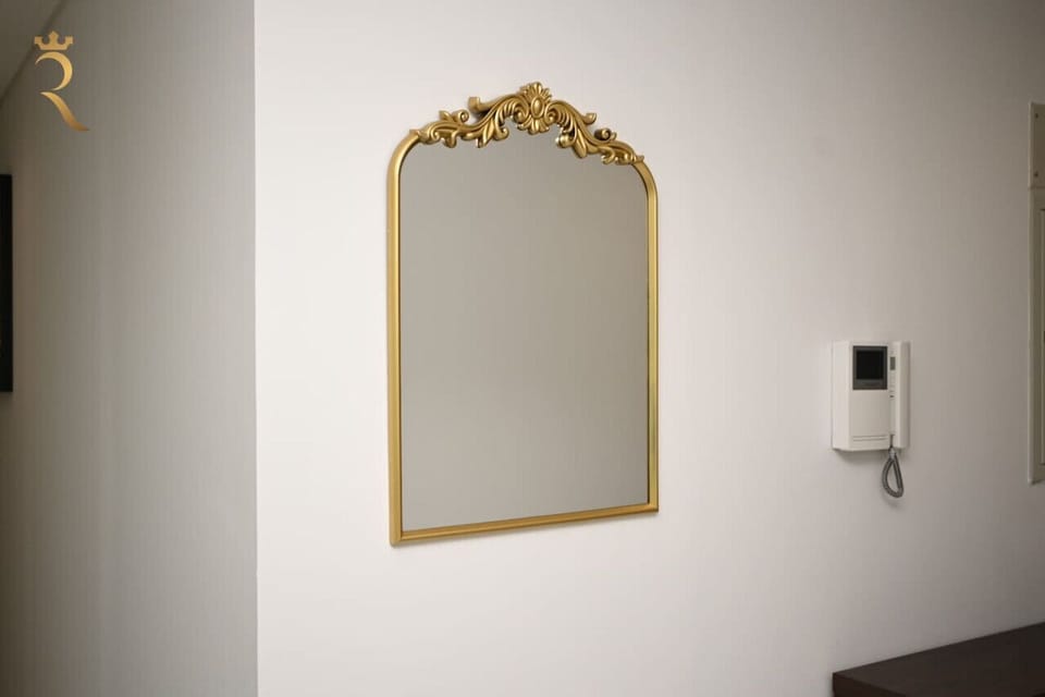 Your style sanctuary awaits. Step into our wardrobe haven, complete with a mirror that reflects your finest moments and outfits.