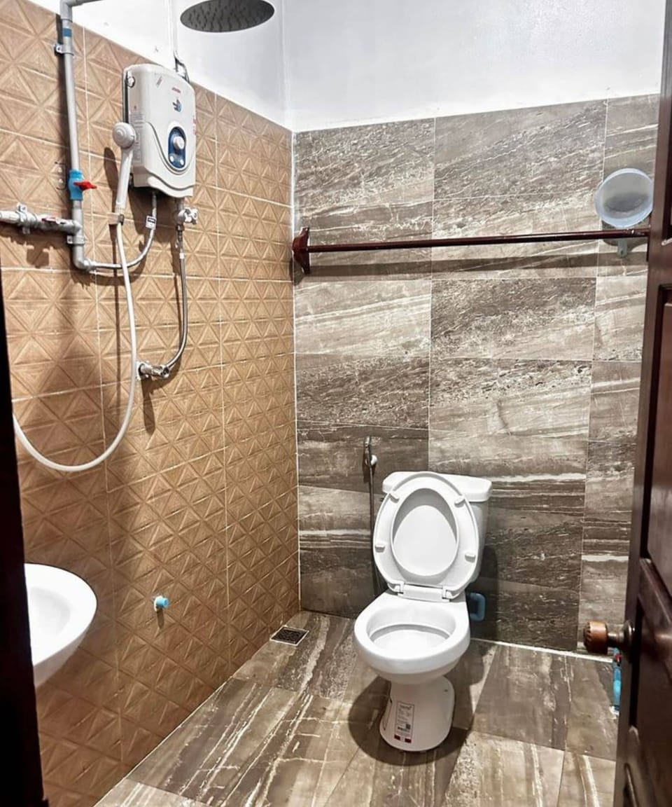 Deluxe Quadruple Room, Balcony, Mountain View | Bathroom | Shower, free toiletries, hair dryer, slippers
