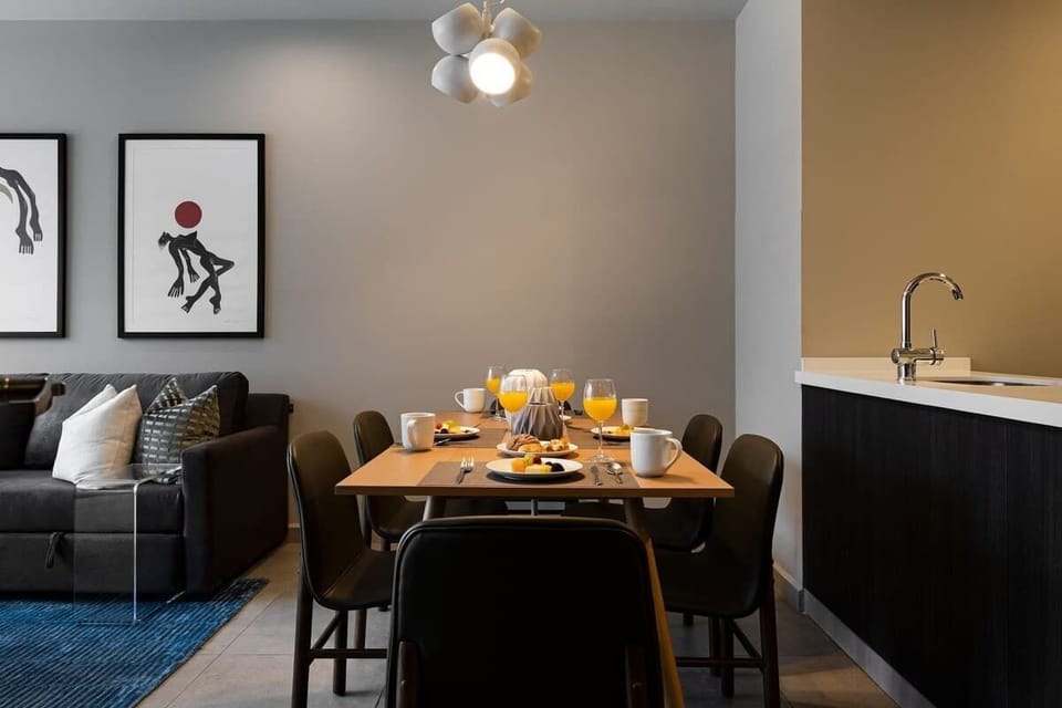 A connected dining and kitchen space made for gatherings.