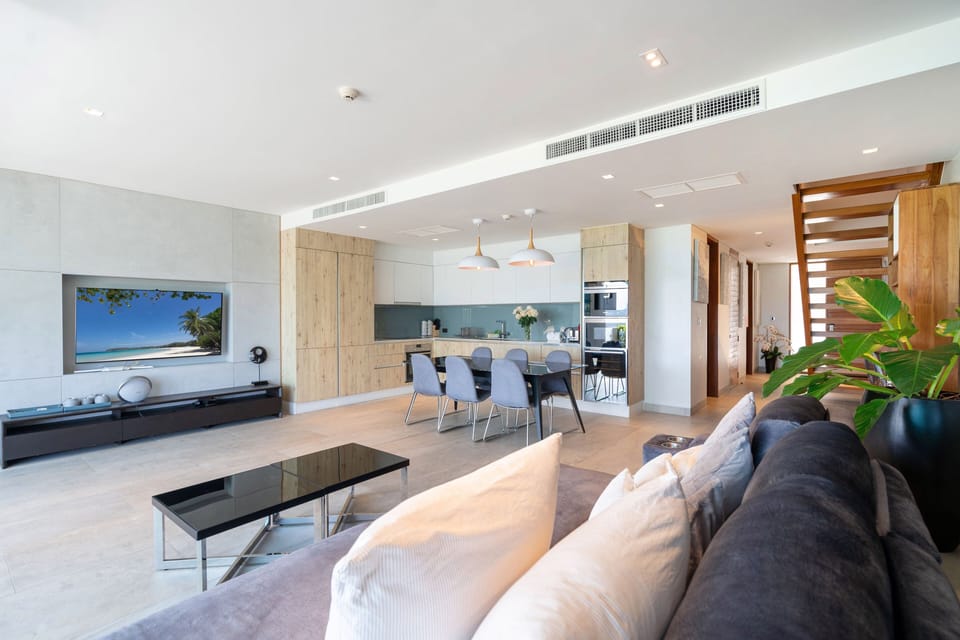 Exclusive Apartment, 3 Bedrooms, Patio, Sea View | Living area | Flat-screen TV