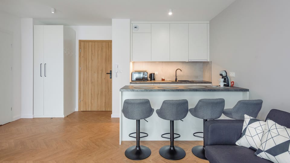 Apartament (A8) | Living area | Flat-screen TV