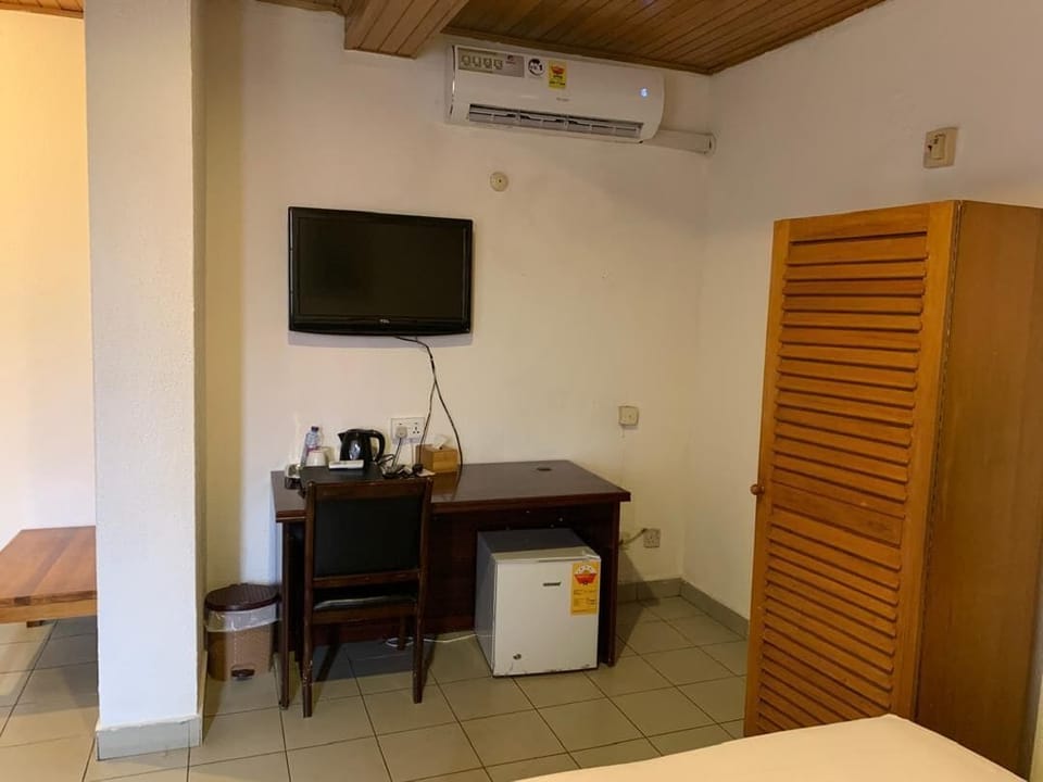 Standard Single Room, City View | In-room safe, desk, laptop workspace, iron/ironing board