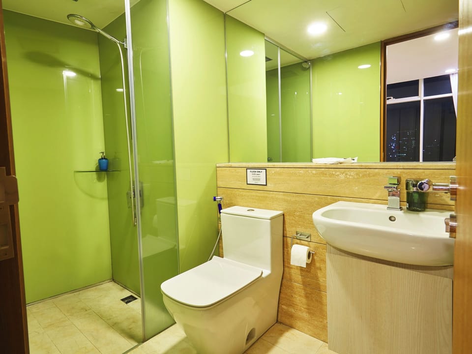 Two Bedrooms Apartment | Bathroom | Shower, rainfall showerhead, hair dryer, slippers