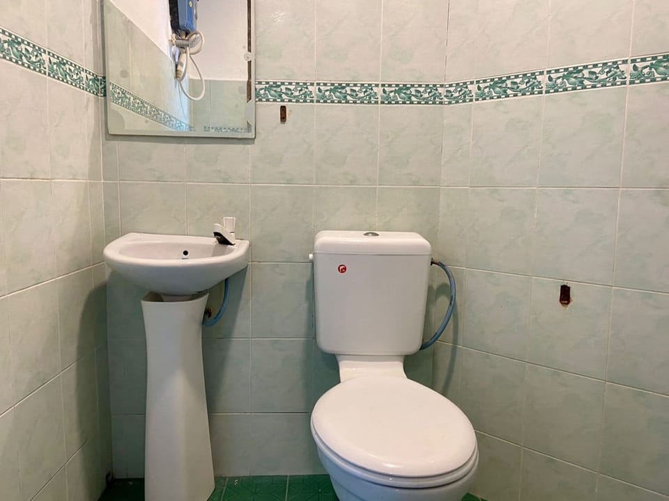 Shower, slippers, towels, soap