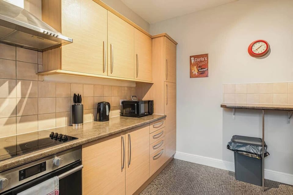 Packed with all the essentials for a hassle-free stay, the kitchen even includes a washing machine for your convenience