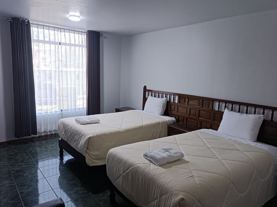 Economy Twin Room, Patio | Desk, free WiFi