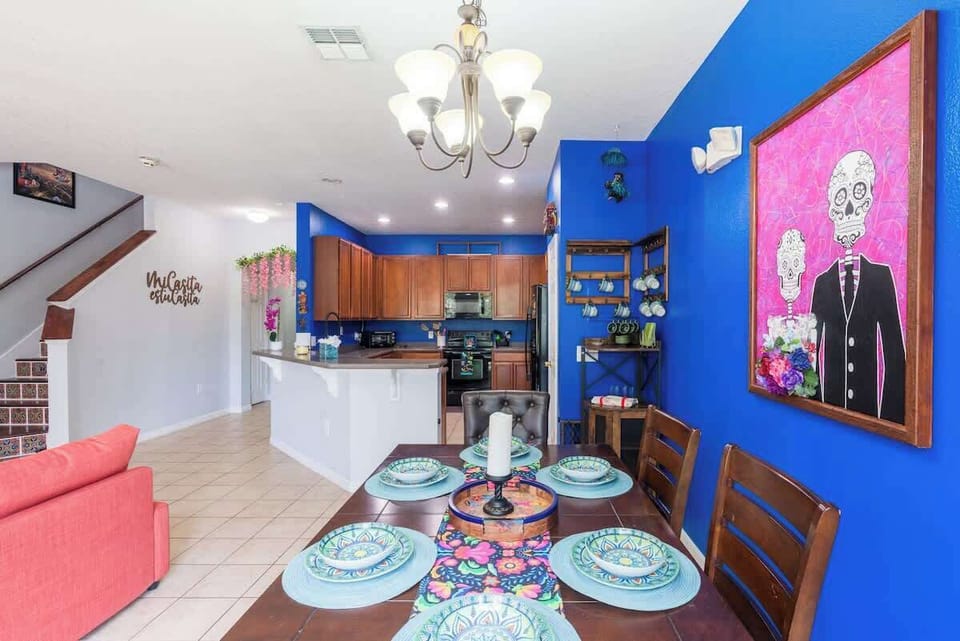 Experience the convenience of an open dining area connected to the kitchen, perfect for family gatherings and themed dinners.