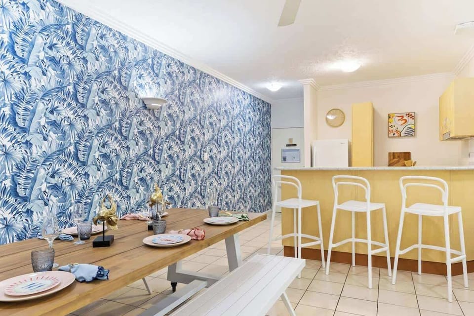 The dining area features seating for six, creating the perfect setting for enjoying meals with family and friends.