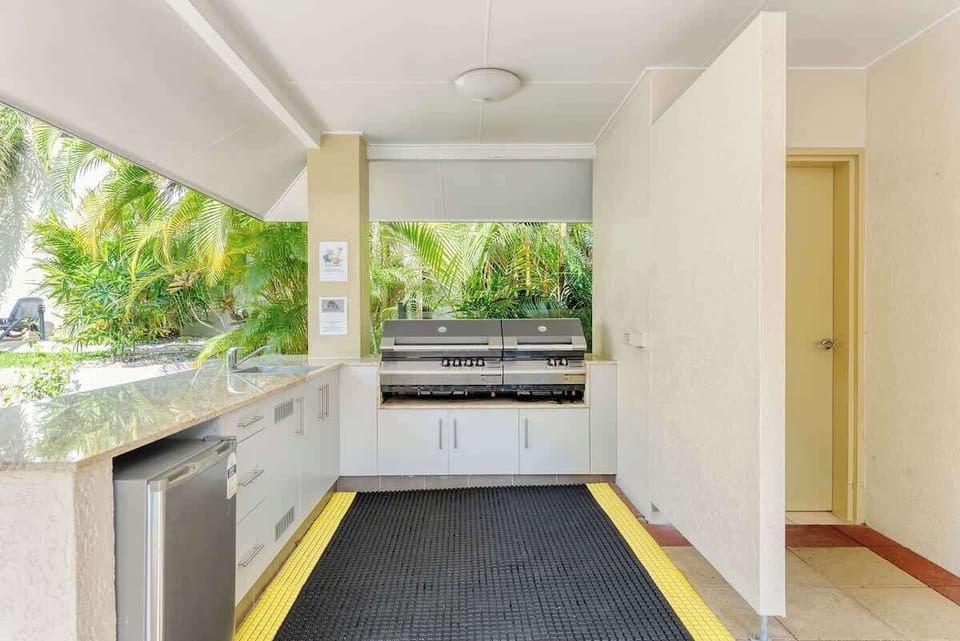 Fire up the BBQ grill and enjoy a delicious outdoor cookout by the pool.