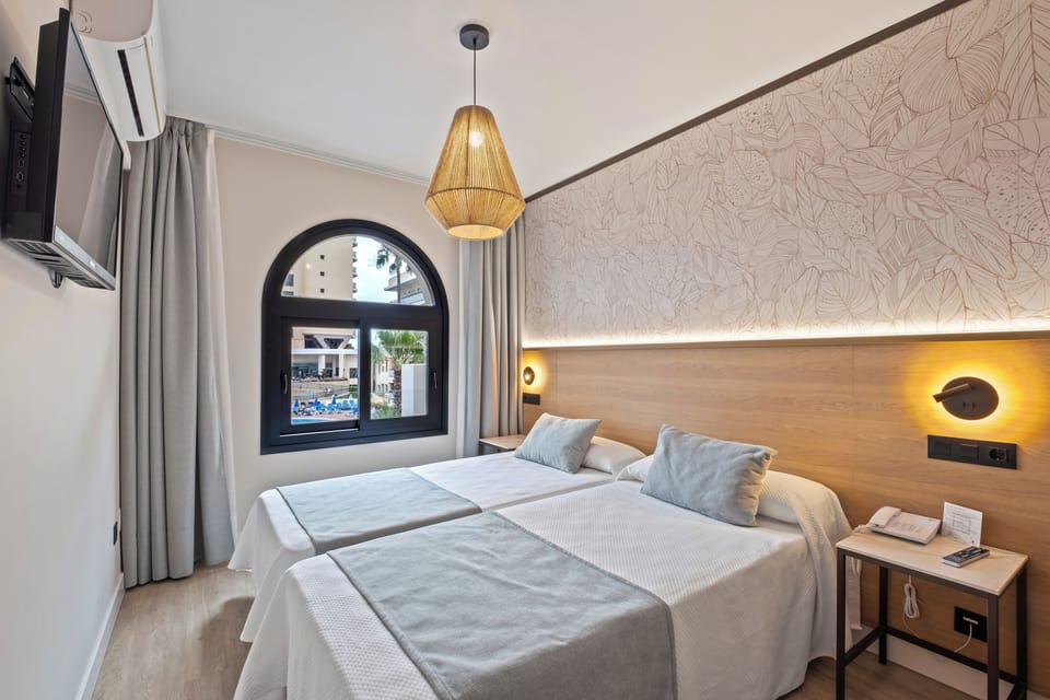 Desk, blackout drapes, free WiFi, bed sheets