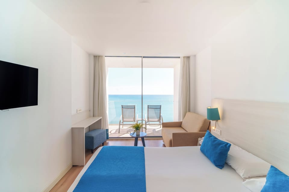 Room, 1 King Bed (Frontal Sea View, 2 Adults) | Down comforters, in-room safe, desk, laptop workspace
