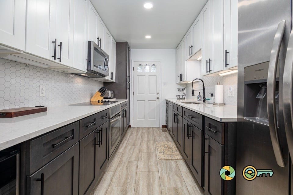 middle level large galley kitchen with tons of storage