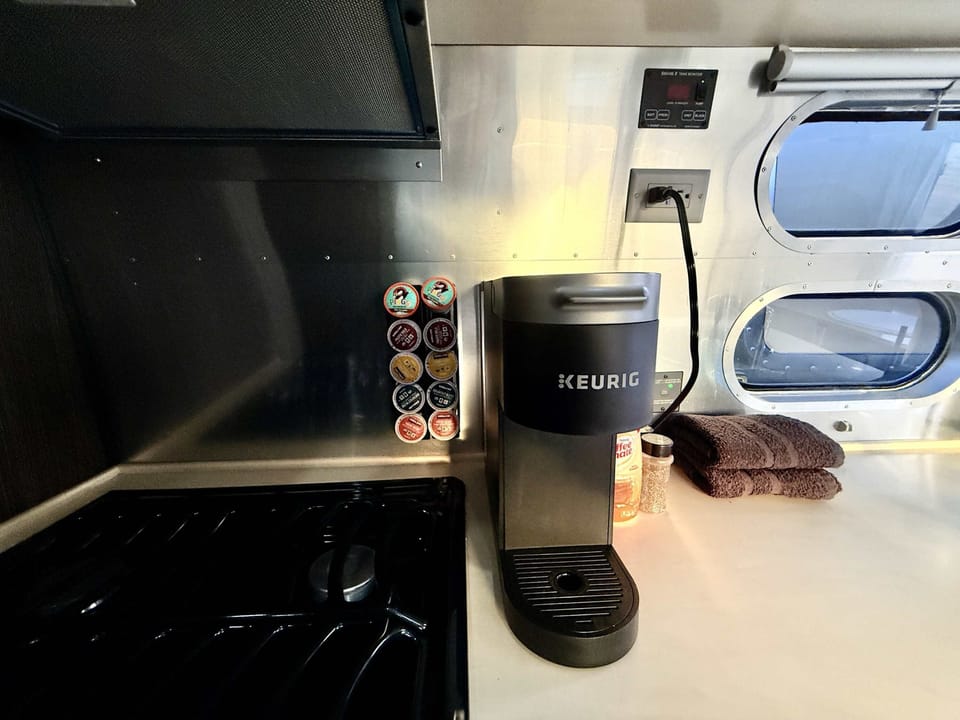 Airstream kitchen essentials stocked for simple meals, snacks, and morning coffee during your Southern Utah glamping stay.