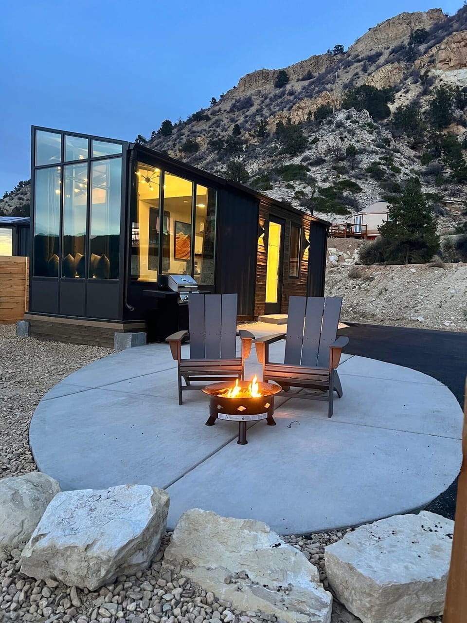 360 views and a glass ceiling inside your East Zion Resort Stargazer Cabin, a cozy and unique stay near Zion National Park and Bryce Canyon.