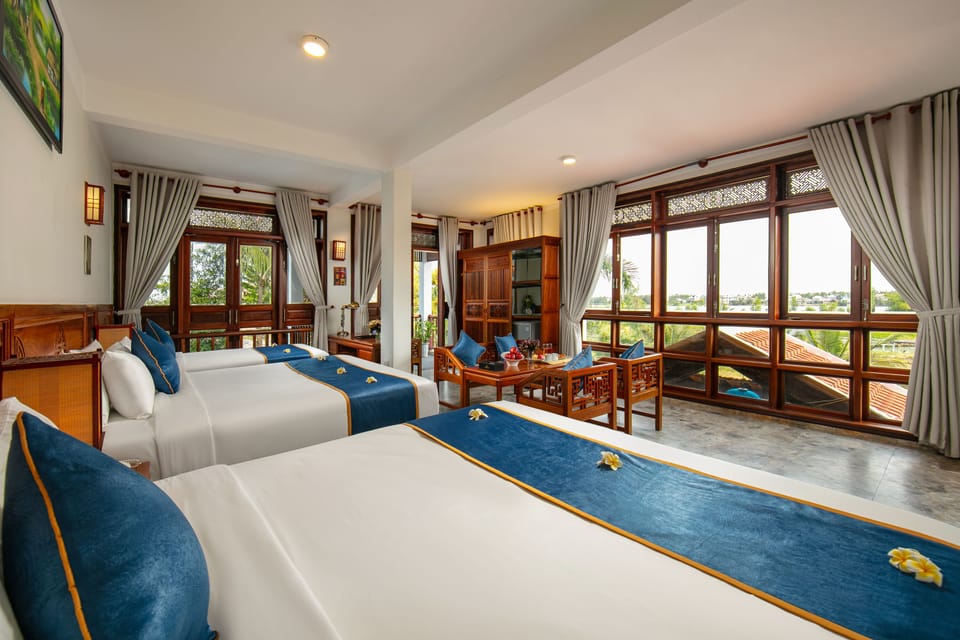Suite Family with Hoi An View | Premium bedding, Select Comfort beds, minibar, in-room safe