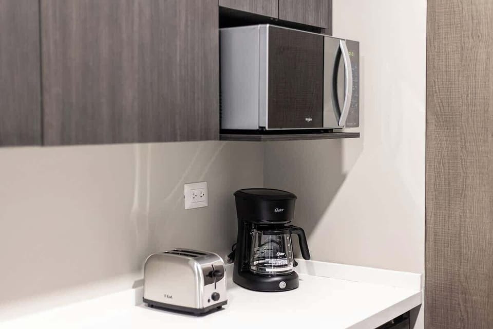  Coffee maker and toaster for easy mornings.