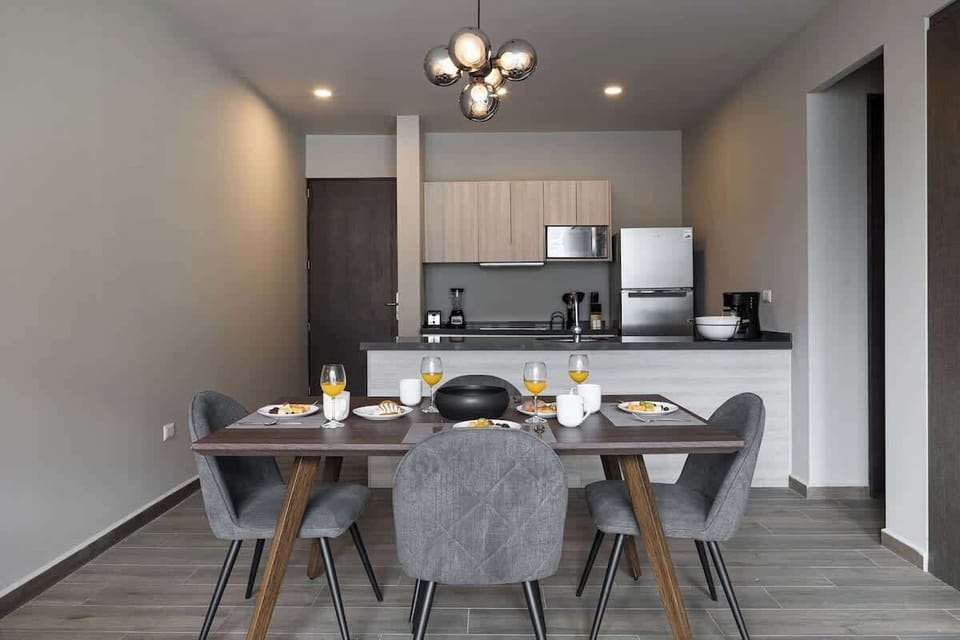 The dining table that can seat 4 is perfect for sit-down meals or working on your laptop if needed. 
