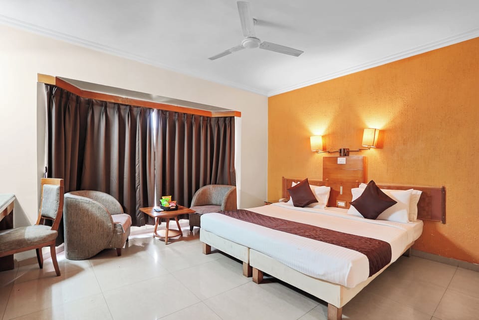 Deluxe Twin Room, City View | In-room safe, desk, laptop workspace, free WiFi