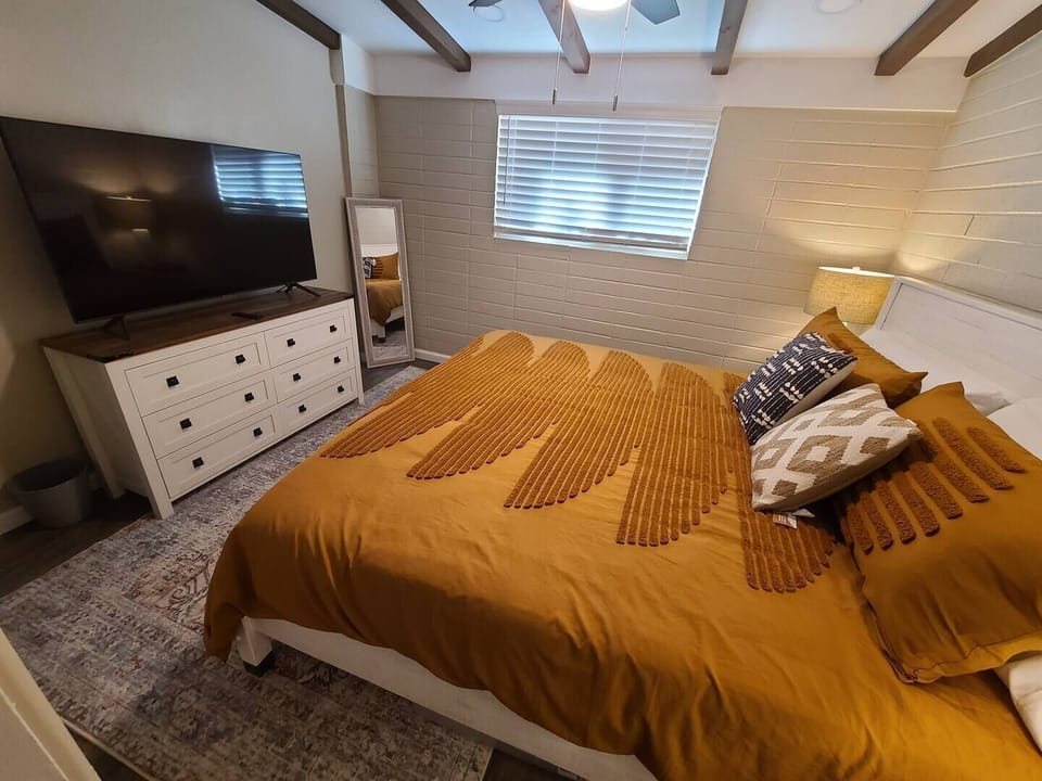 55" Samsung smart TV, and a large dresser for added storage. 