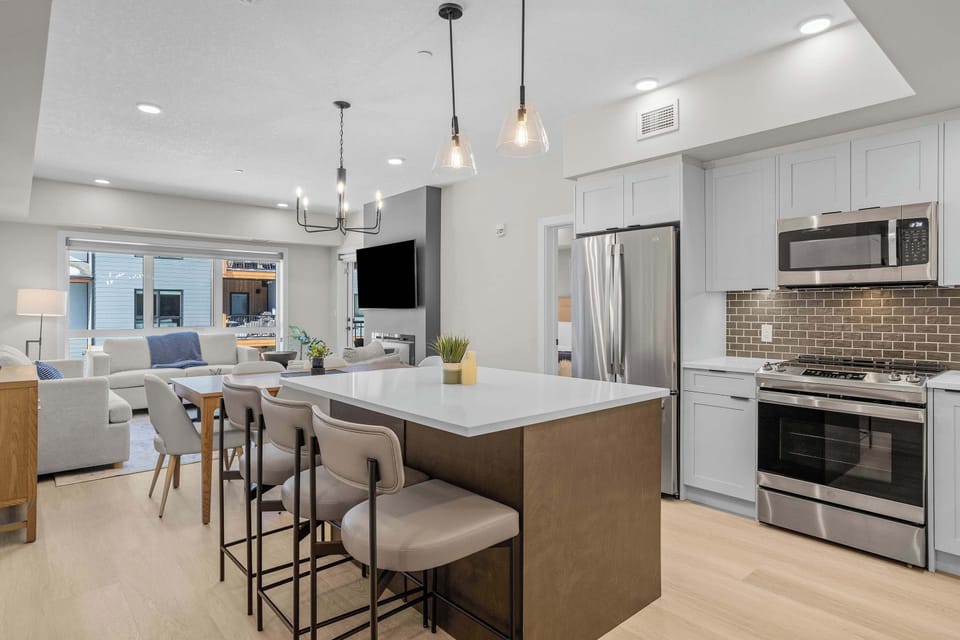 Enter into a seamless cooking, dining and living experience with lots of natural light