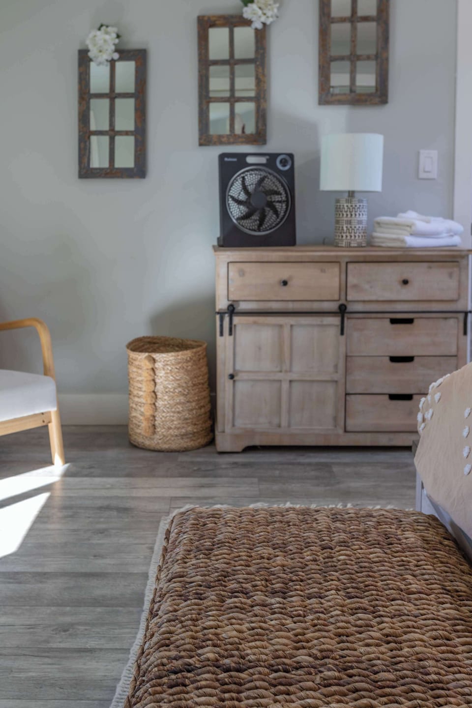 Natural textures and soft tones come together to create this calming, effortlessly stylish atmosphere, perfect for unwinding and relaxing in this beautifully curated space.