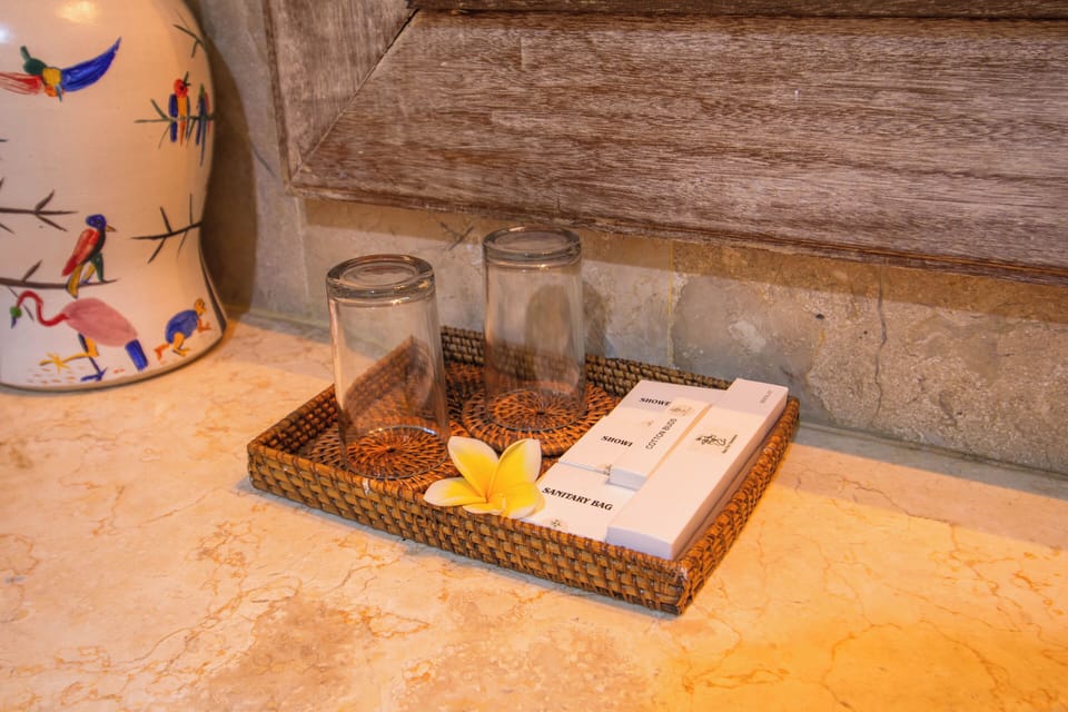 Luxury Studio Suite, 1 King Bed, Balcony, Garden View | Bathroom | Shower, free toiletries, towels, soap