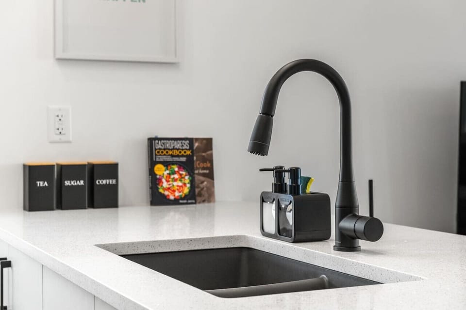 Step into a brand-new, modern kitchen fully stocked for your convenience. It features a seasoning kit, a premium knife set, and a Keurig machine with complimentary coffee pods. You’ll have everything you need to cook and enjoy your meals in style, with ad
