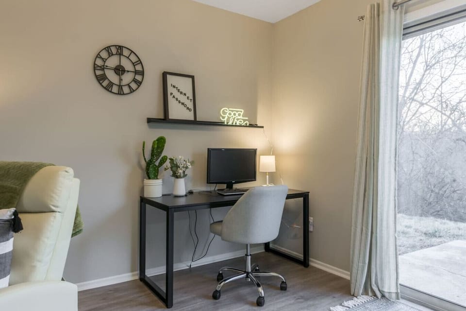 A functional and modern workspace with a sleek desk, comfortable chair, and ample storage. The space is designed for productivity, offering a quiet and organized environment for work or study.