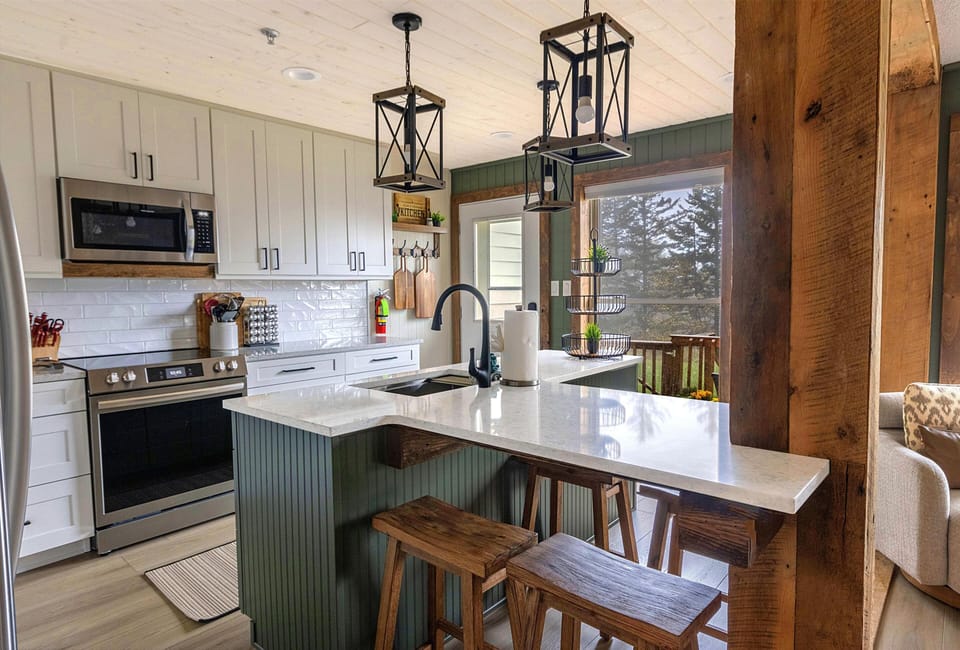 From the lovely kitchen, you can observe the beauty of the outdoors!