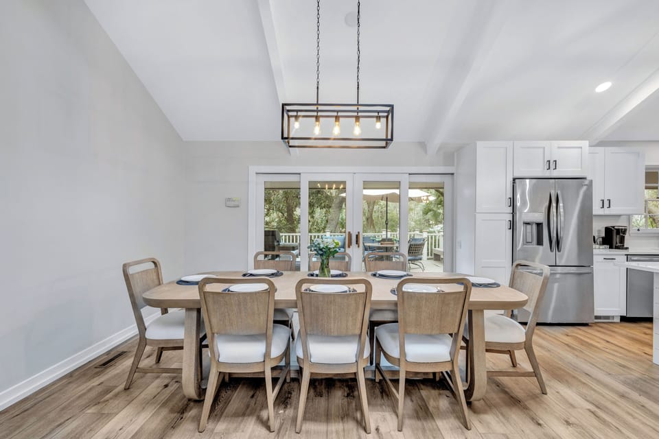 Dining table seats 8 - Perfect for shared moments and lively conversations, it creates an inviting atmosphere for gatherings and dining experiences.