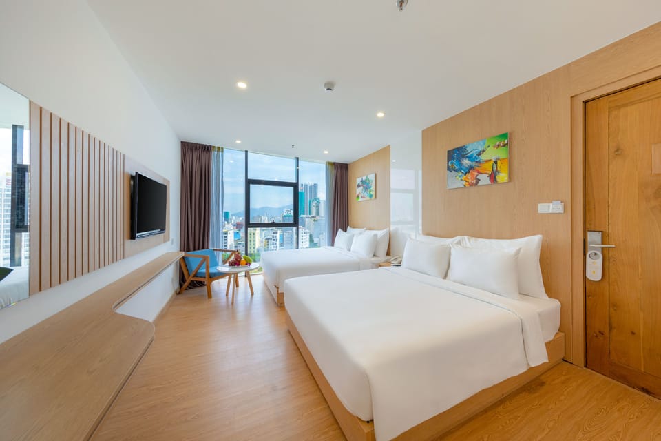 Family Suite, Partial Sea View | Minibar, in-room safe, desk, WiFi (free)