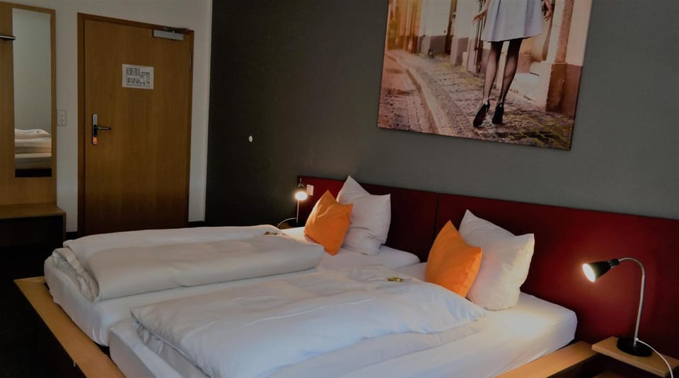 Premium bedding, desk, laptop workspace, soundproofing