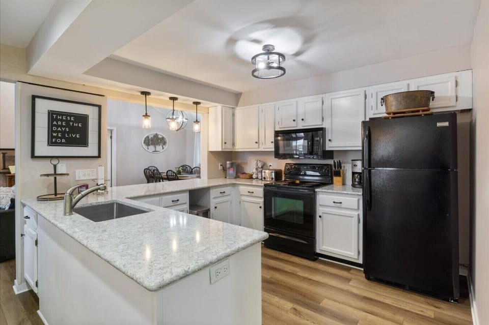 Spacious kitchen featuring abundant countertop space, ample cabinets, and brand-new stainless steel appliances