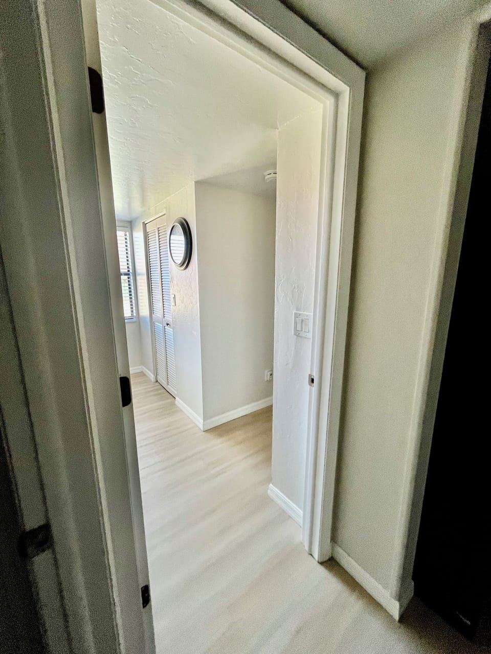 Entrance to master bedroom wing off kitchen