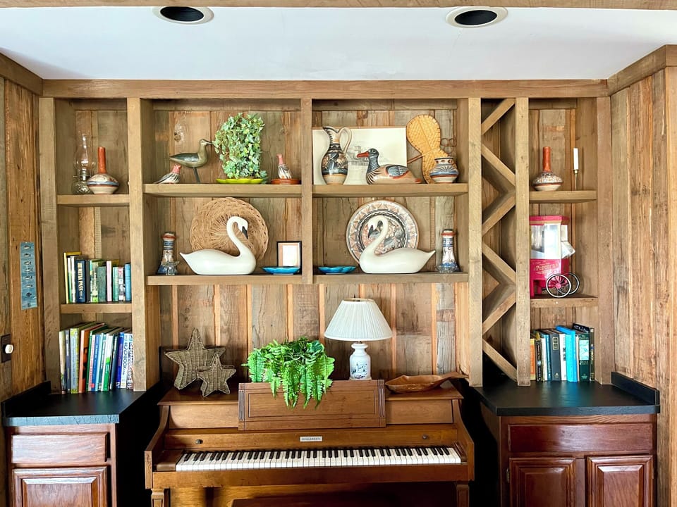 shelves and piano