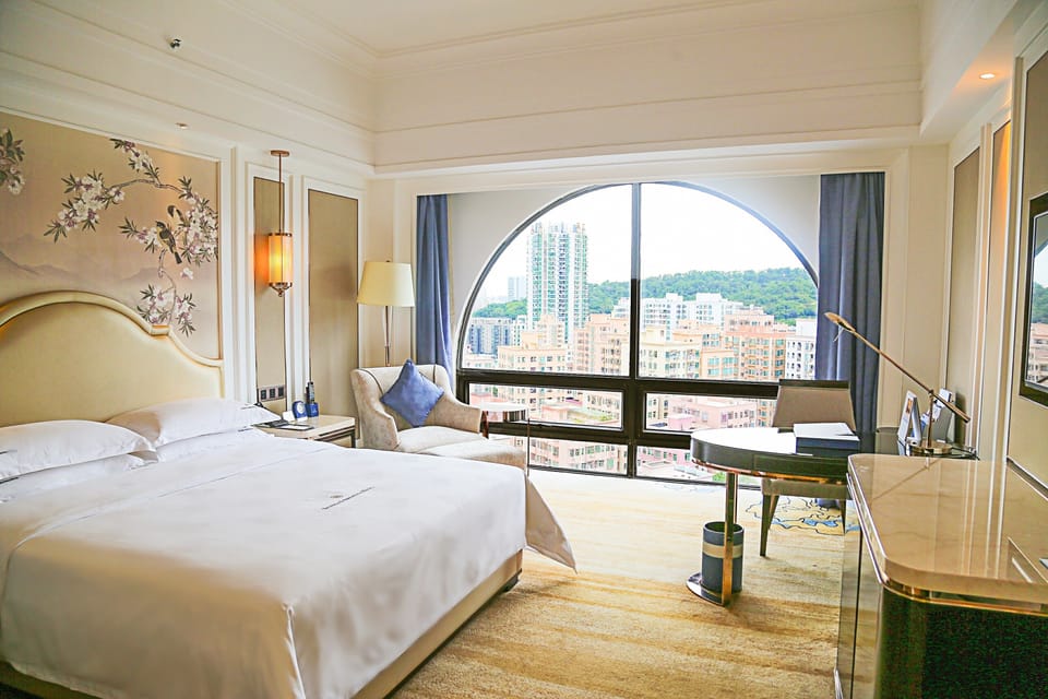Premium bedding, down comforters, pillowtop beds, minibar