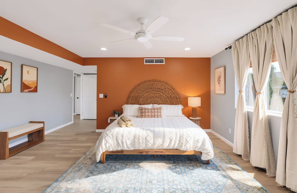 King Ensuite | Patio Access, Mountain Views, Waterfall Shower, Safe & 55" TV