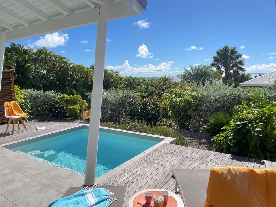 Iguane House villa Corail piscine jardin vue mer