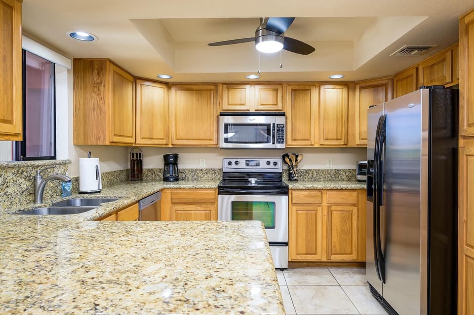 Bright fully stocked kitchen.