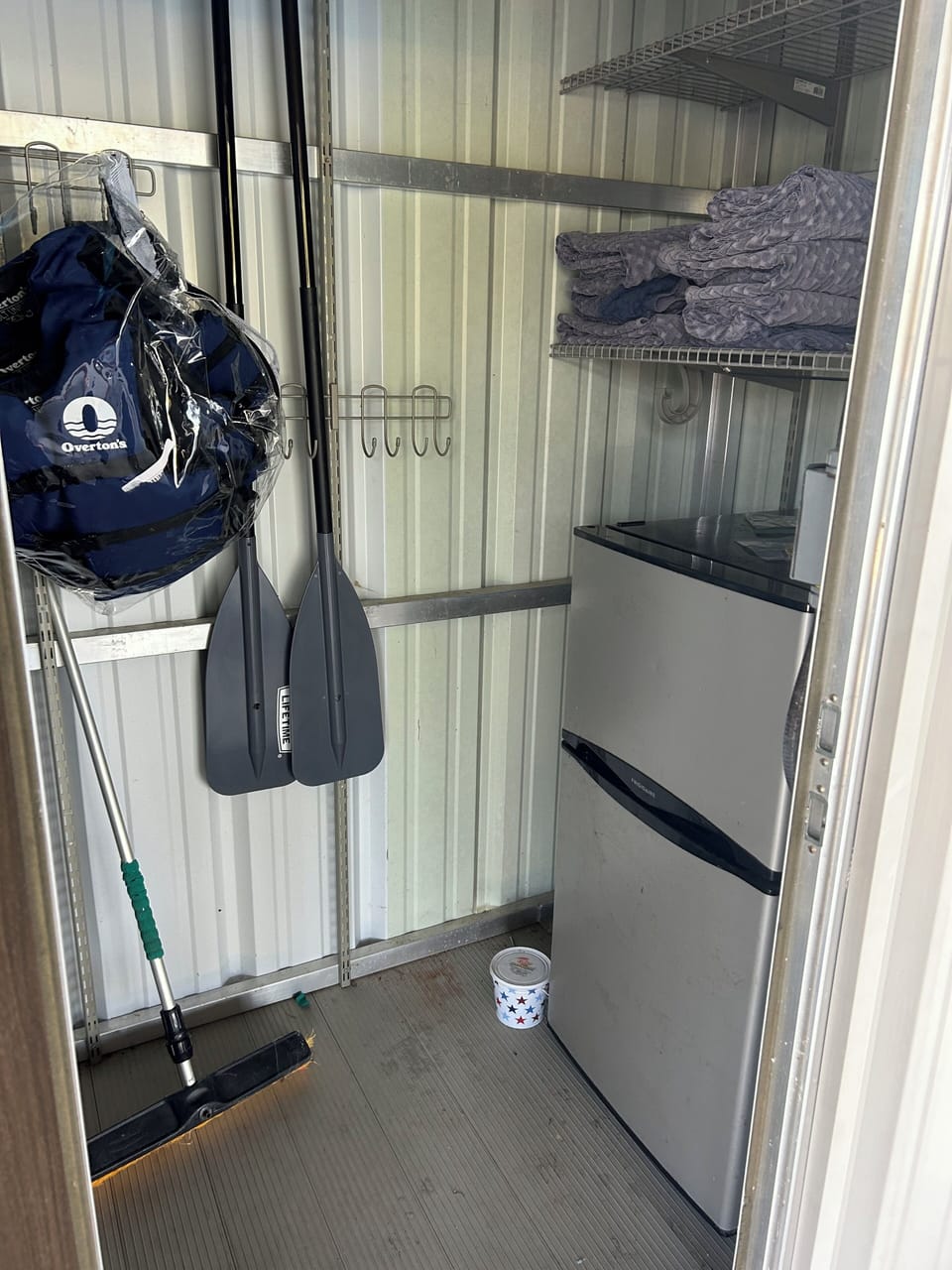 Closet to store you bags, snacks and keep your beverages cold in the fridge.