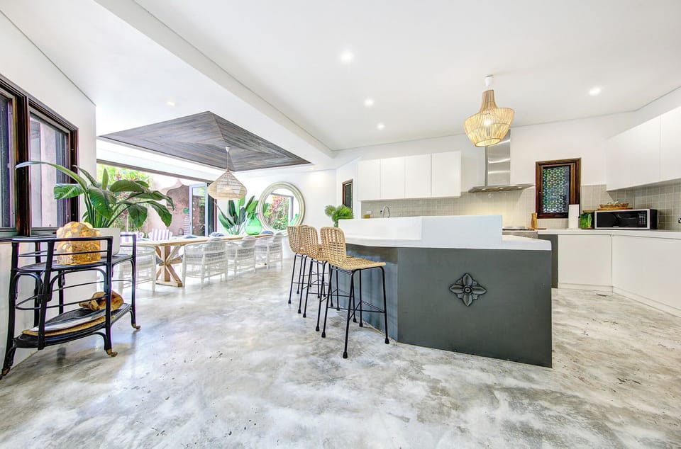 Open plan living with dining area flowing onto the kitchen and living area.