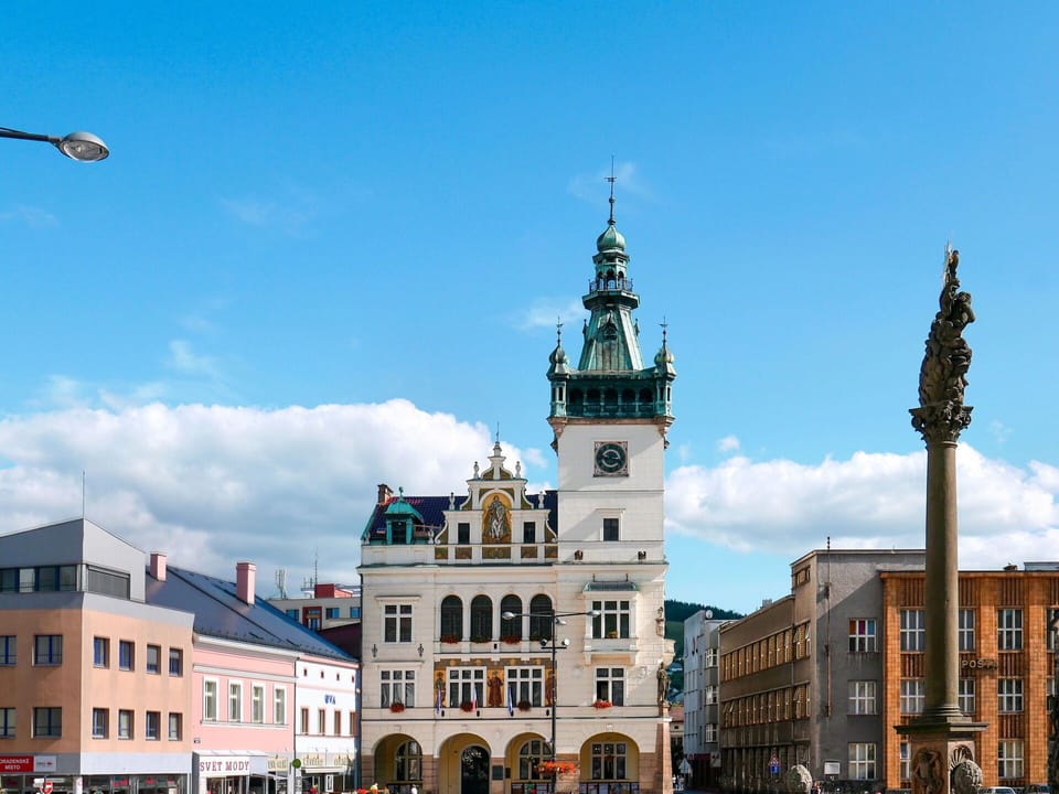 Sky, Building, City, Urban Area, Facade, Town, Landmark, Public Space, Tourist Attraction